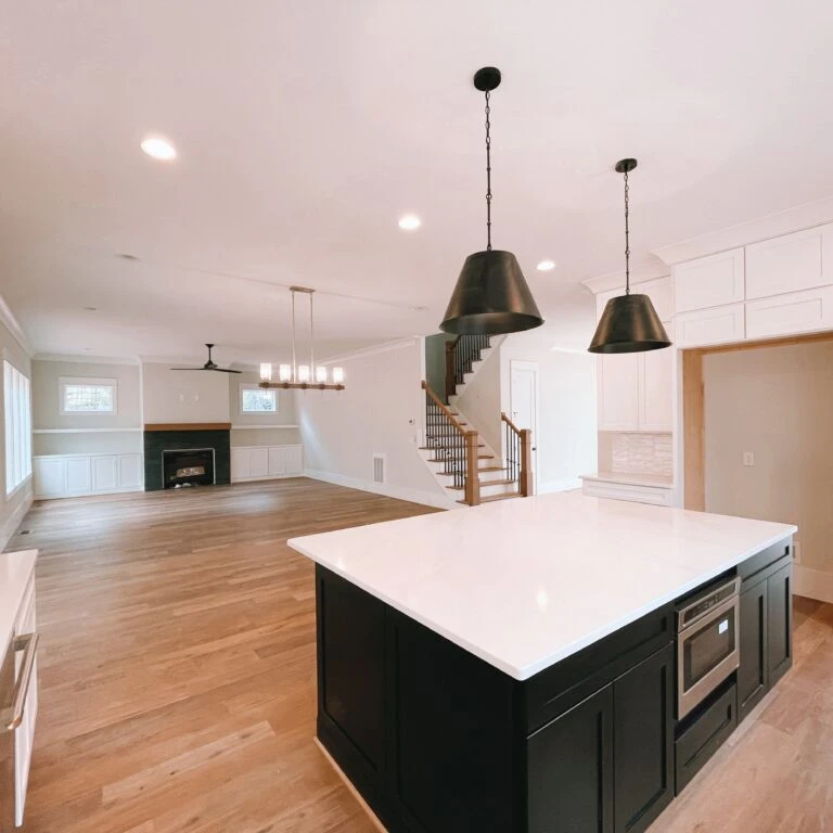 Spacious modern kitchen with island and pendant lights